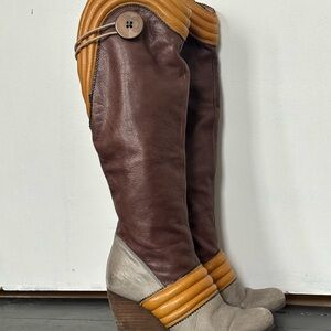 Elegant Brown and Tan Heeled Boots